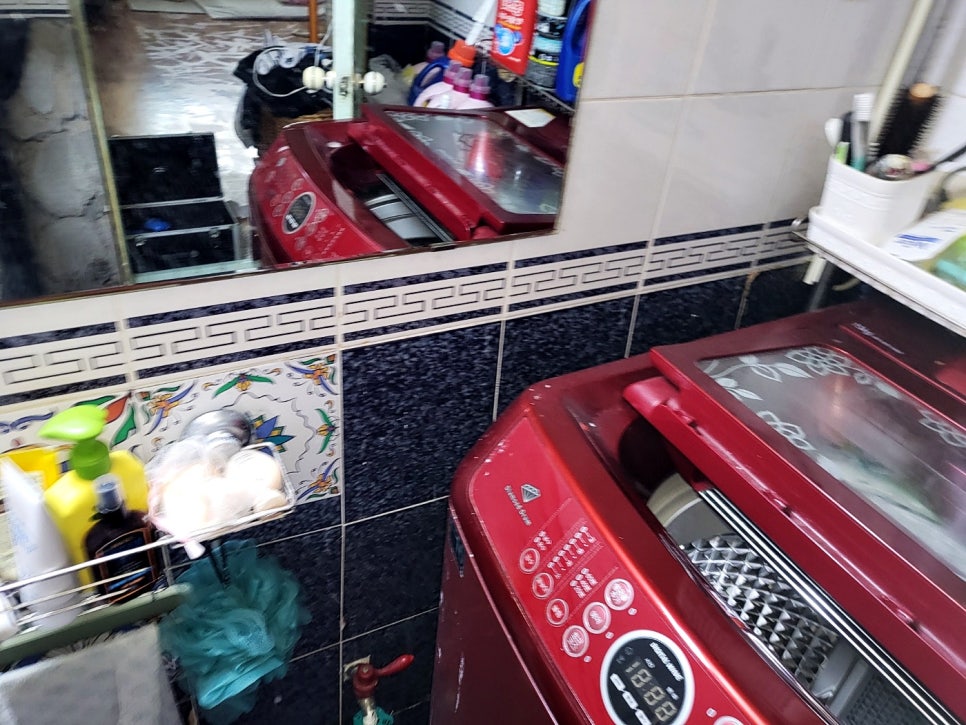 세탁기가 있는 욕실 환경